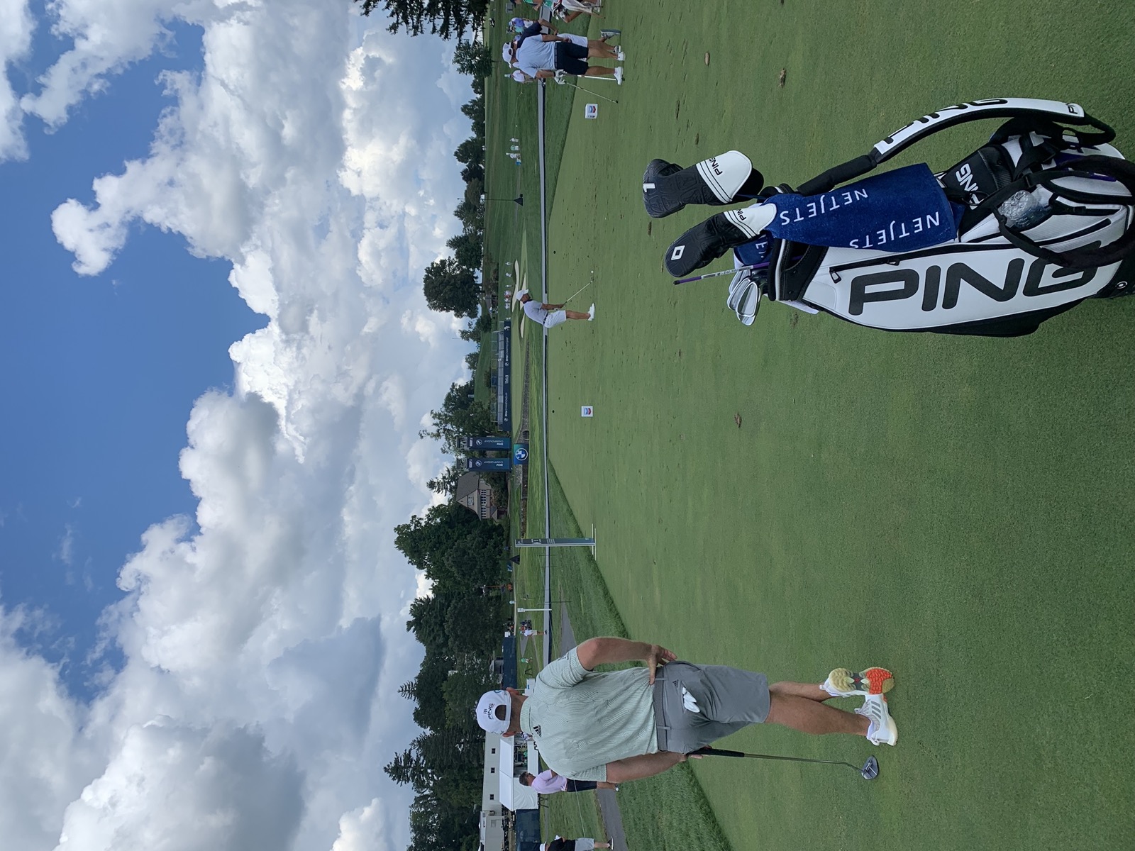 Behind Tyrrell Hatton on the driving range with his PING bag